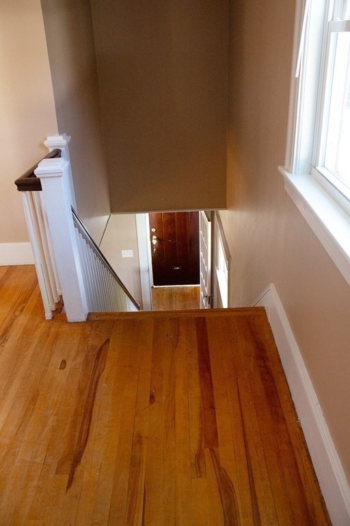 175 June Street Worcester, MA 01602 - Photo 17 of 30 a bedroom with a bed and a window