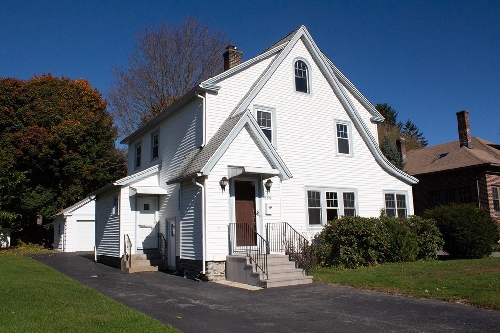 175 June Street Worcester, MA 01602 - Photo 2 of 30 a front view of a house with a yard