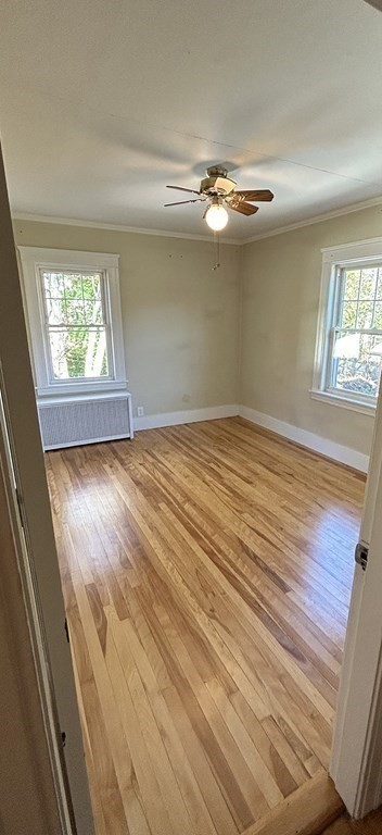 175 June Street Worcester, MA 01602 - Photo 22 of 30 wooden floor in an empty room with a window