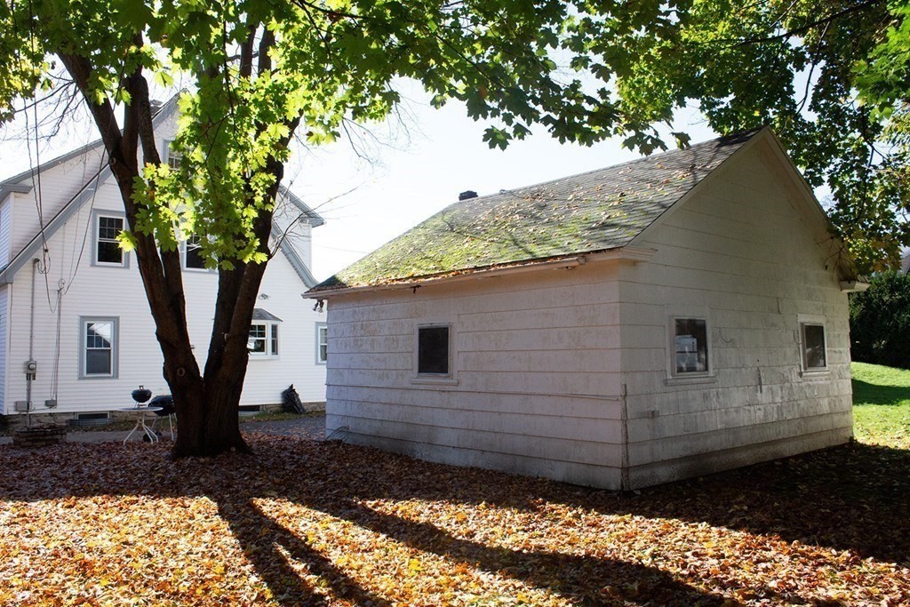 175 June Street Worcester, MA 01602 - Photo 4 of 30 a view of a small house with a tree