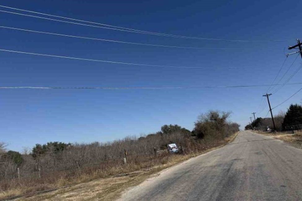 851 Old San Antonio Road Dale, TX 78616 - Photo 6 of 6 a view of a rural road with plants