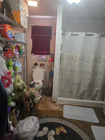 a view of a back yard of the house