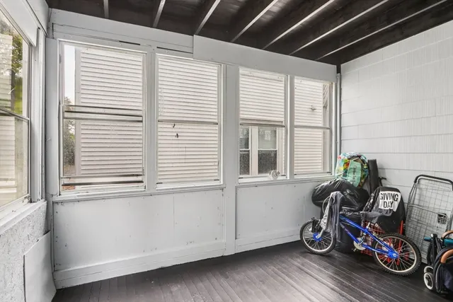 a bathroom with a sink mirror and a bathtub