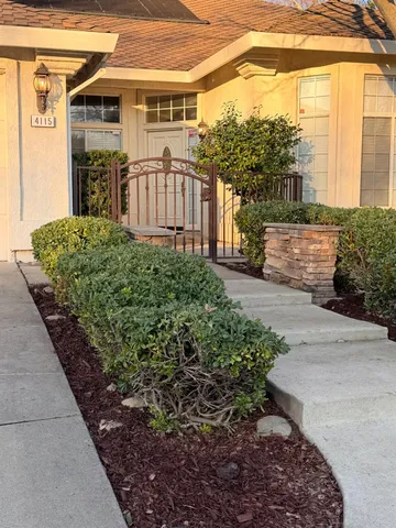 a view of a back yard of the house