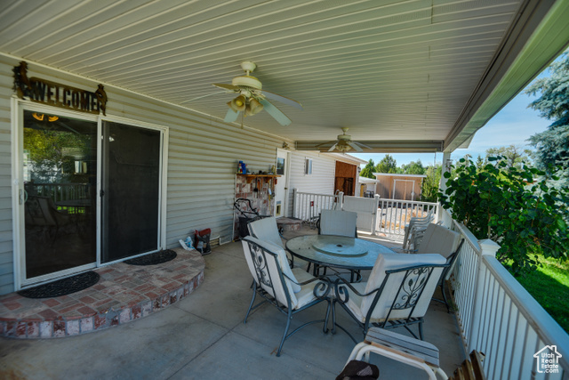 2373 East 190 North Beaver, UT 84713 - Photo 52 of 54 View of patio with outdoor dining area and ceiling fan