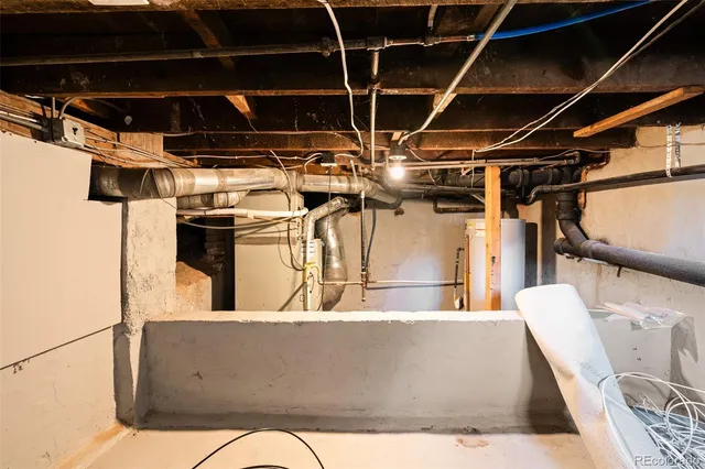 a view of a room with wooden cabinets