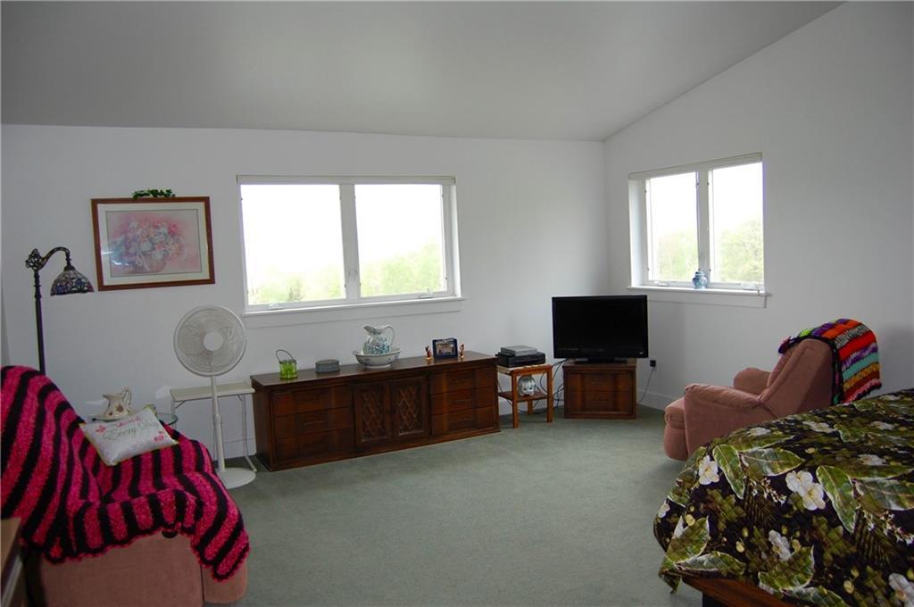 1631 Rangeley Road Phillips, ME 04966 - Photo 20 of 35 The Master Suite lives up to its...