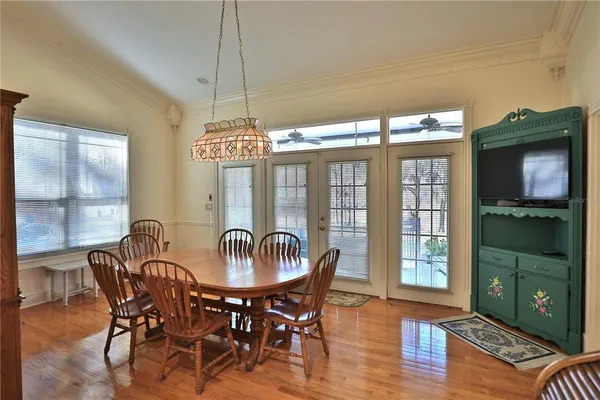 a view of an entryway with wooden floor