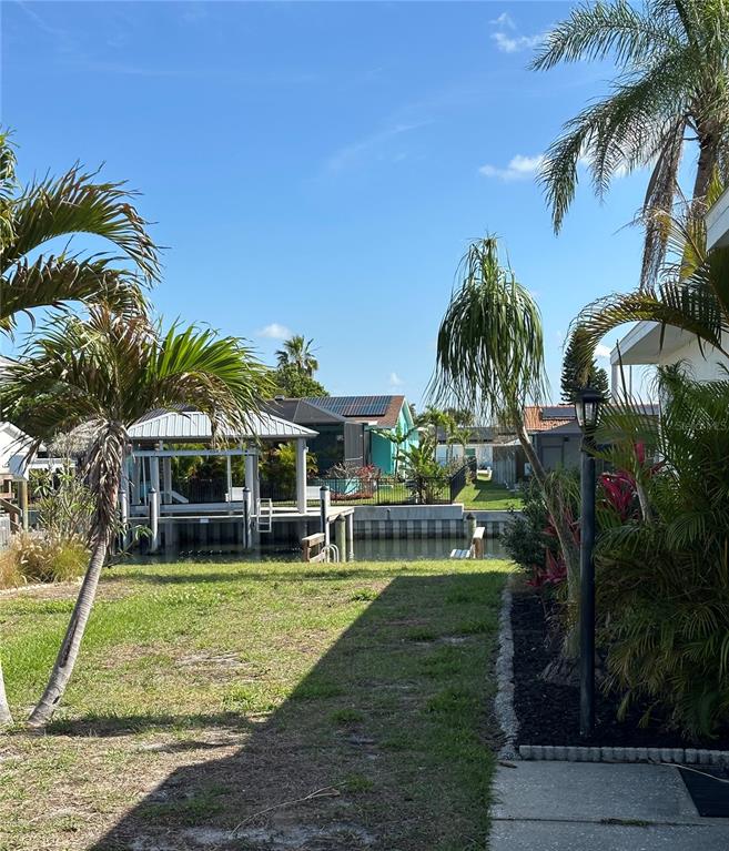 1025 Apollo Beach Boulevard, Unit D Apollo Beach, FL 33572 - Photo 2 of 8 a view of a house with a yard