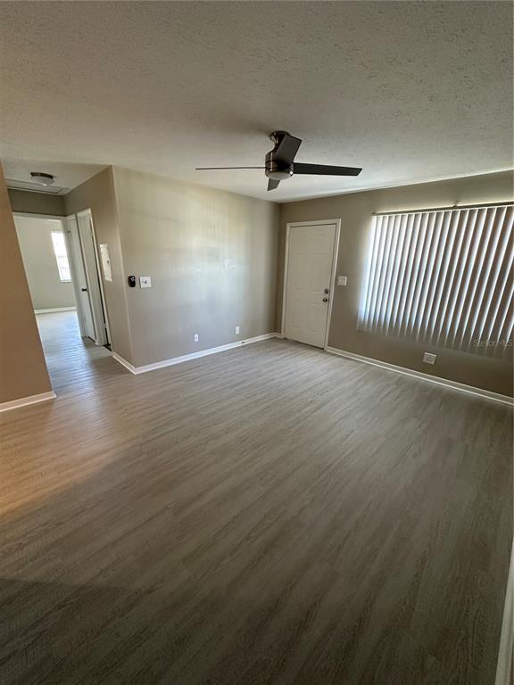 1025 Apollo Beach Boulevard, Unit D Apollo Beach, FL 33572 - Photo 6 of 8 a view of an empty room with a window