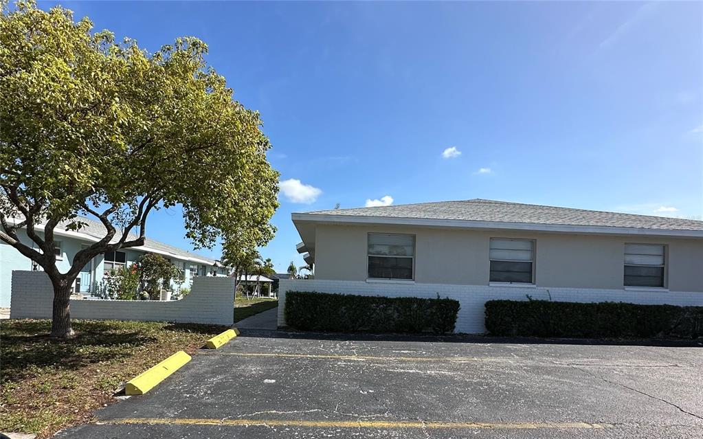 1025 Apollo Beach Boulevard, Unit D Apollo Beach, FL 33572 - Photo 8 of 8 a front view of a house with a yard