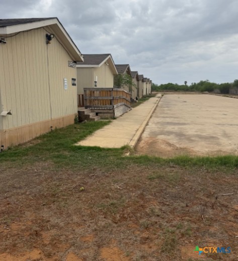 1100 County Road 4600 Dilley, TX 78017 - Photo 2 of 7 a view of a house with a yard