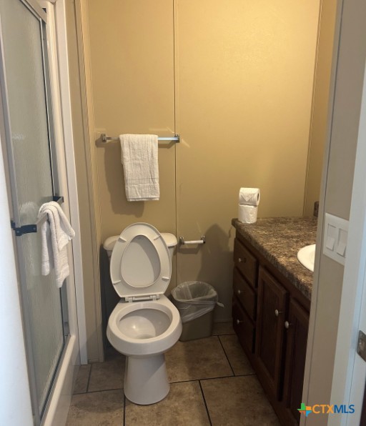1100 County Road 4600 Dilley, TX 78017 - Photo 6 of 7 a bathroom with a toilet and a sink