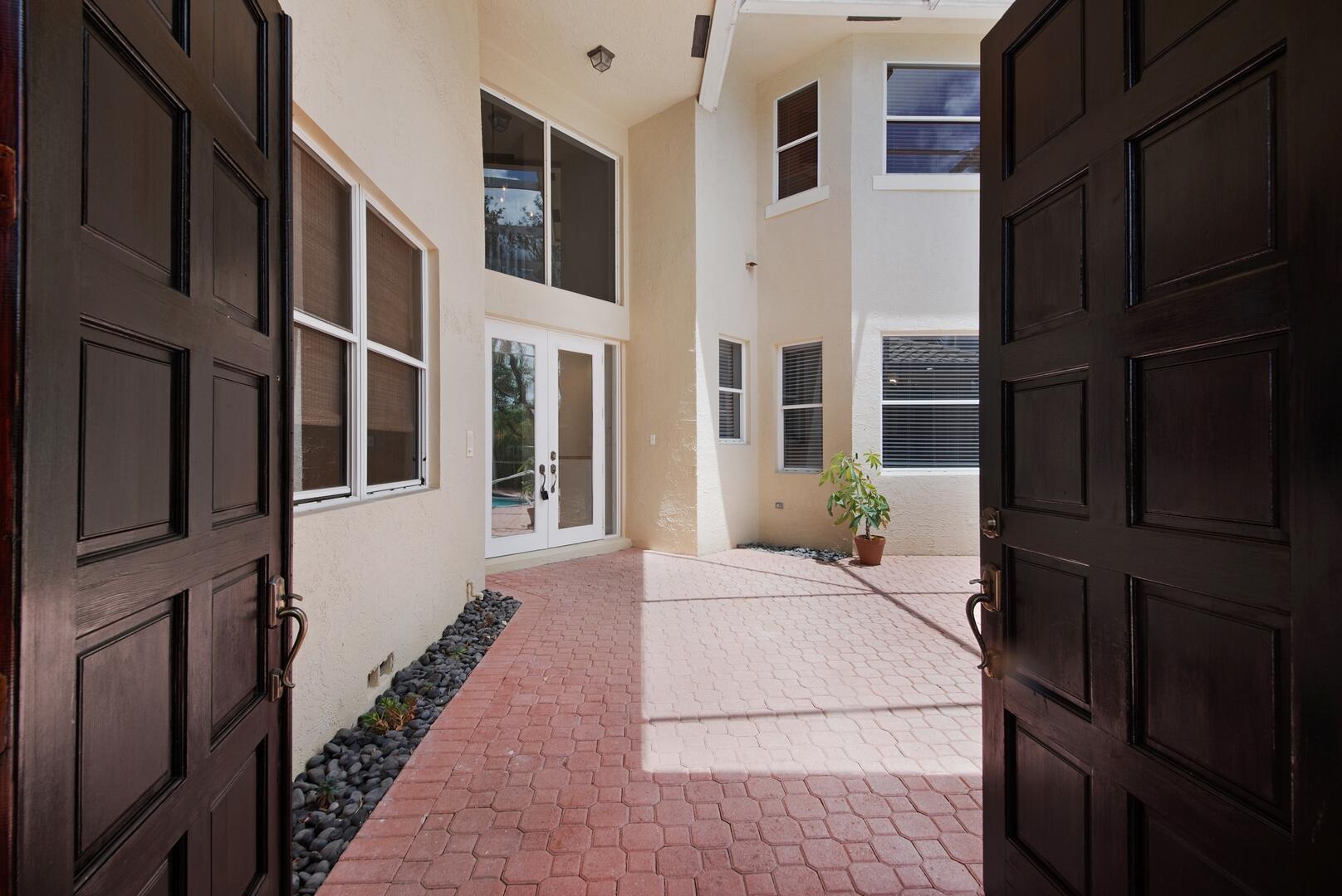 10825 Ravel Court Boca Raton, FL 33498 - Photo 32 of 48 Double Door Entrance