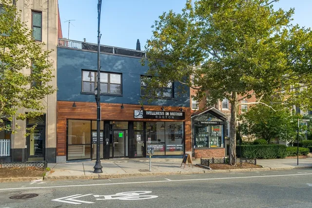 a view of a building with a street