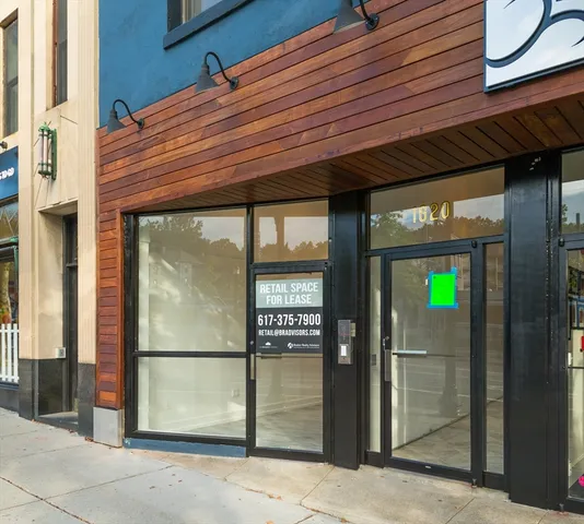 a front view of a building with glass windows