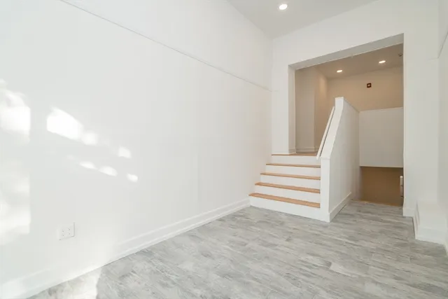 a view of entryway with stairs