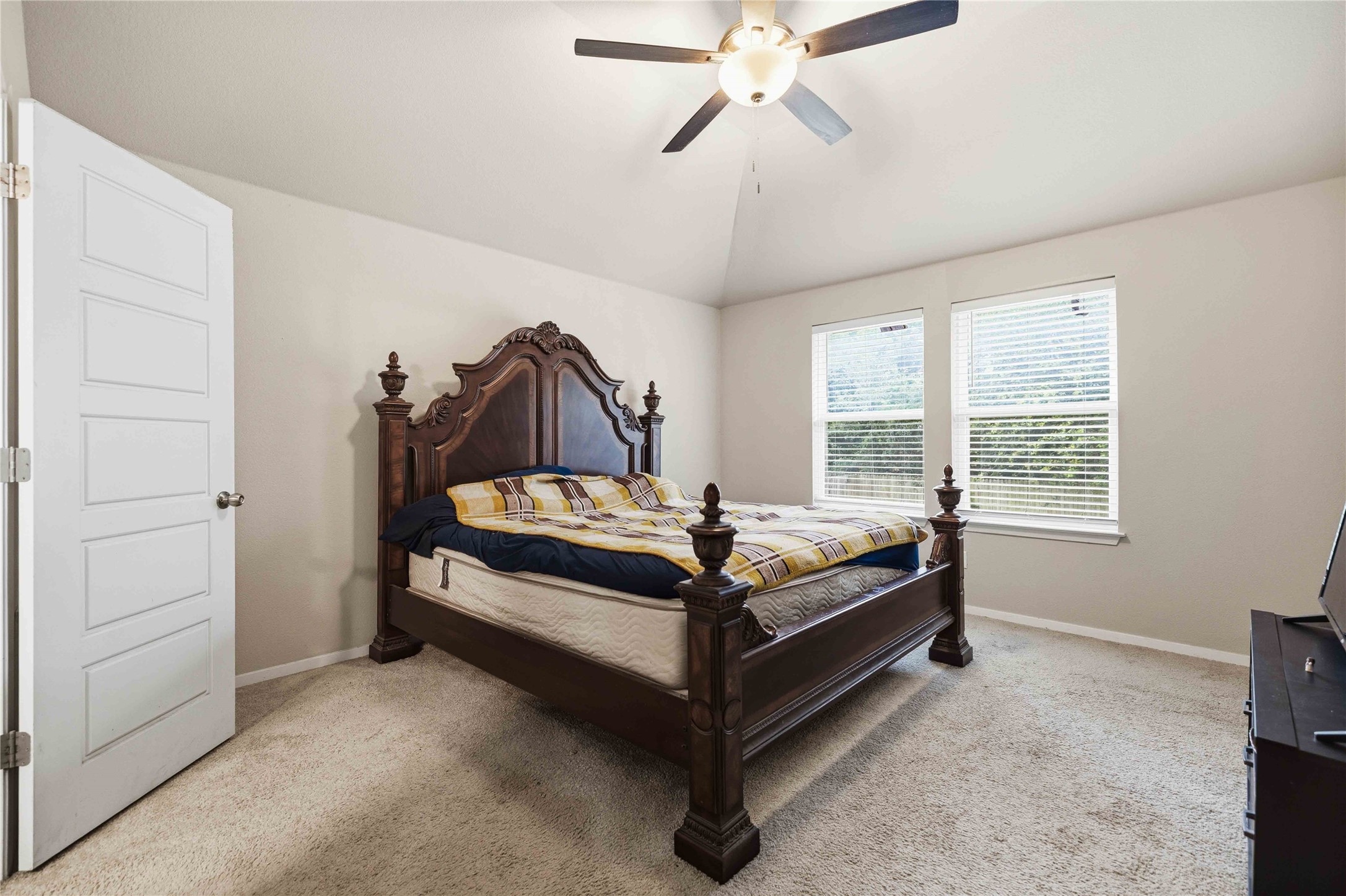 107 Saranac Drive Elgin, TX 78621 - Photo 9 of 17 a bedroom with bed and window