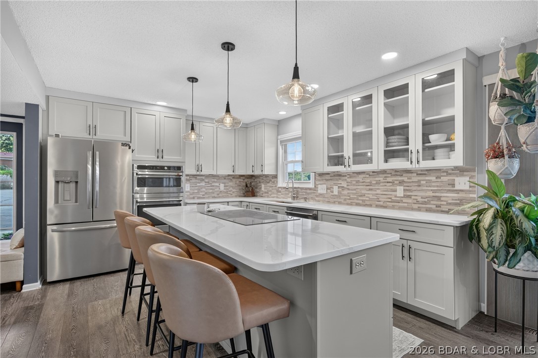 26427 Lake Front Road Rocky Mount, MO 65072 - Photo 2 of 69 Beautifully curated finishes, elegant viened count