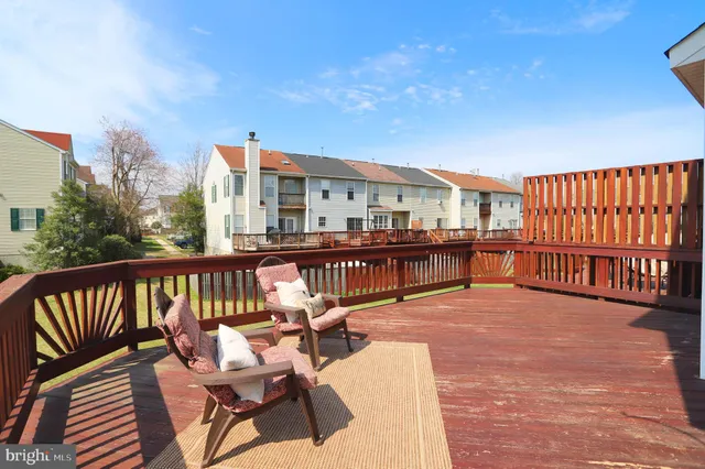 a view of a balcony with chairs