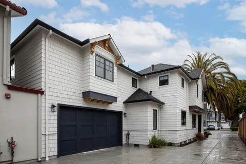 a view of front of house with garage