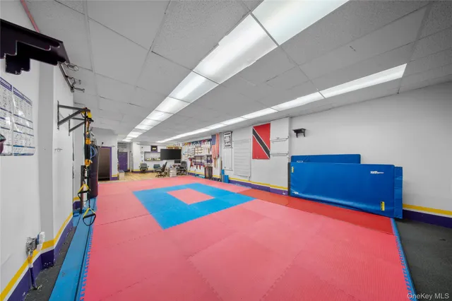 a room with furniture and pool table