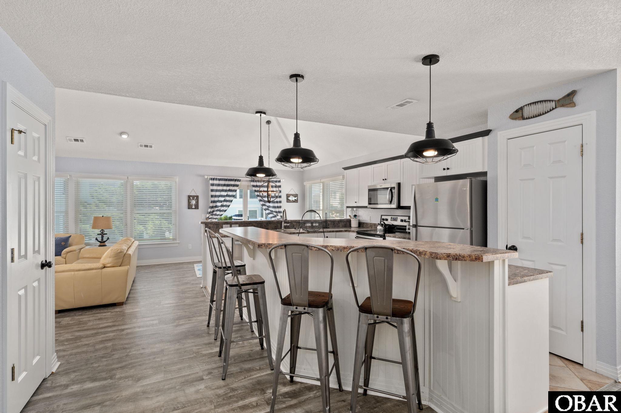 718 Moon Gate Lane, Unit 50 Corolla, NC 27927 - Photo 7 of 50 Extra Seating and Prep Island