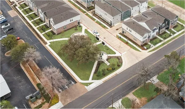 a view of garage with two chair and a door