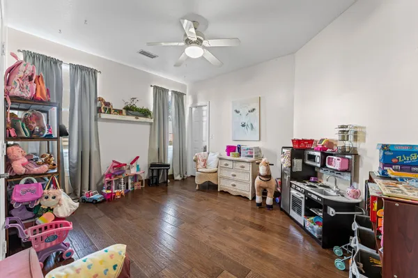 a kids room with toys and toys