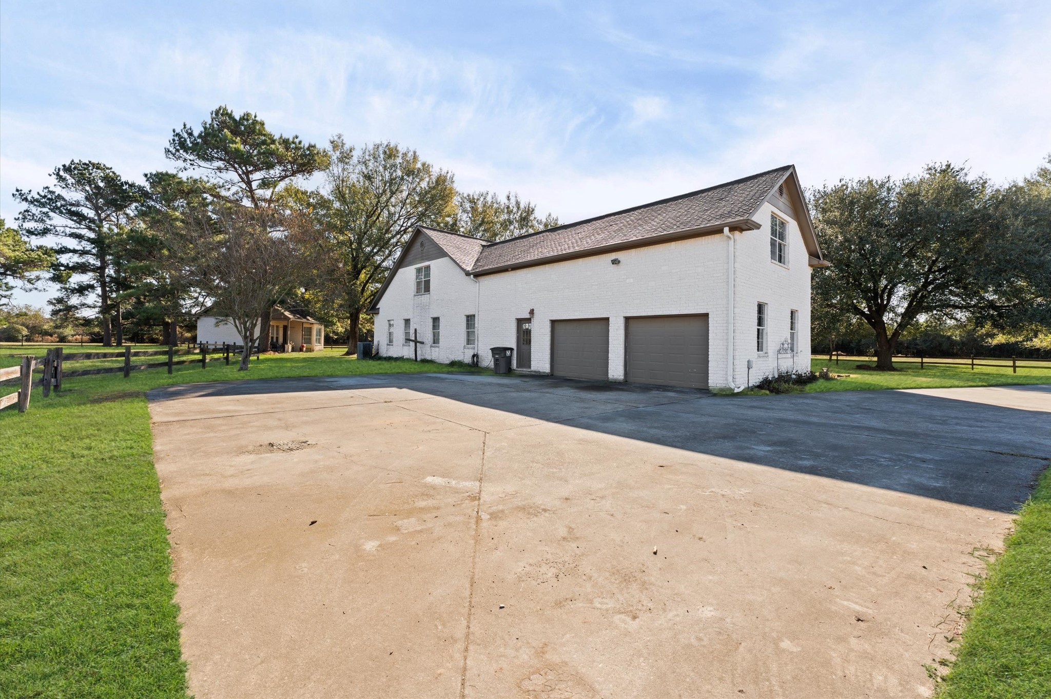 21550-21554 Mueschke Road Tomball, TX 77377 - Photo 2 of 42 a view of a house with a yard