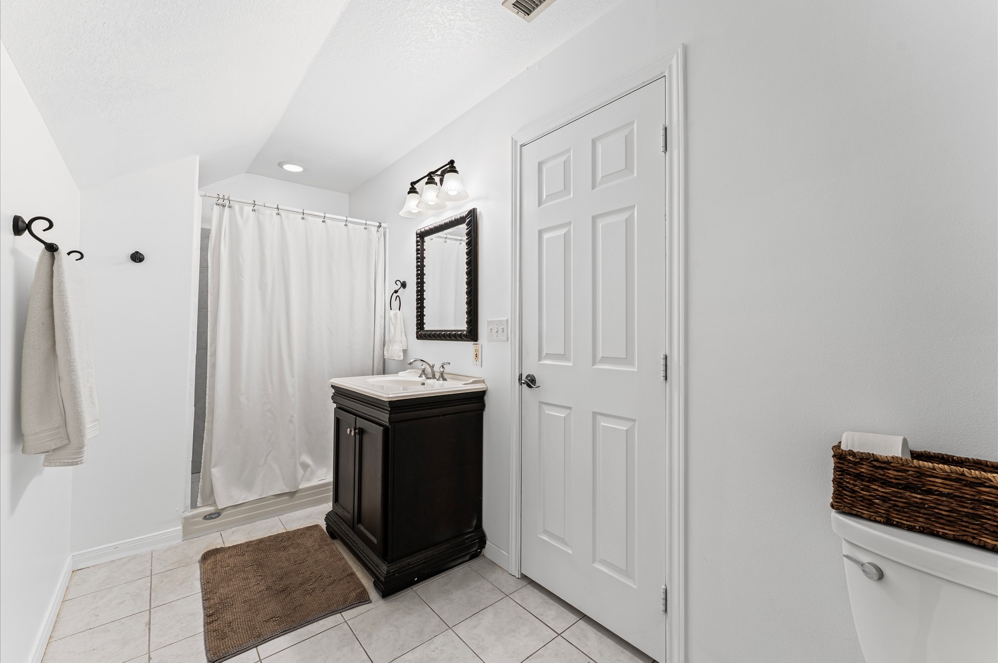 21550-21554 Mueschke Road Tomball, TX 77377 - Photo 22 of 42 a kitchen with stainless steel appliances granite countertop a stove and a refrigerator