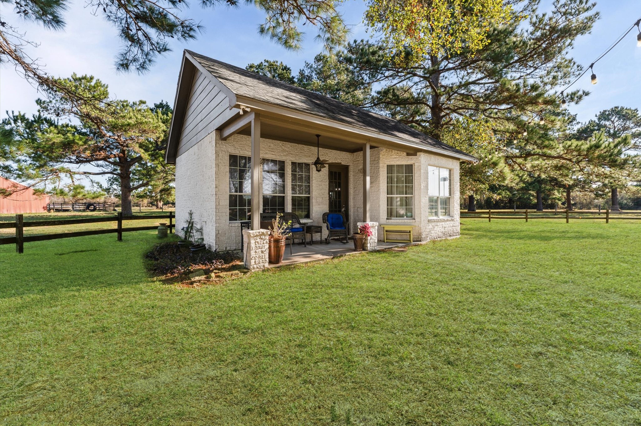 21550-21554 Mueschke Road Tomball, TX 77377 - Photo 27 of 42 a view of a house with backyard porch and garden