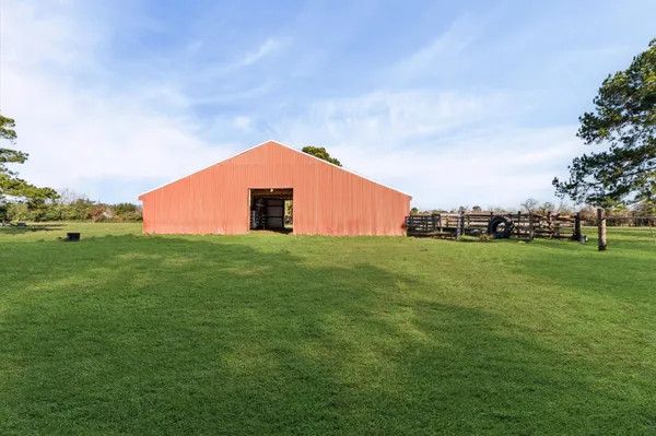 a view of a house with a big yard