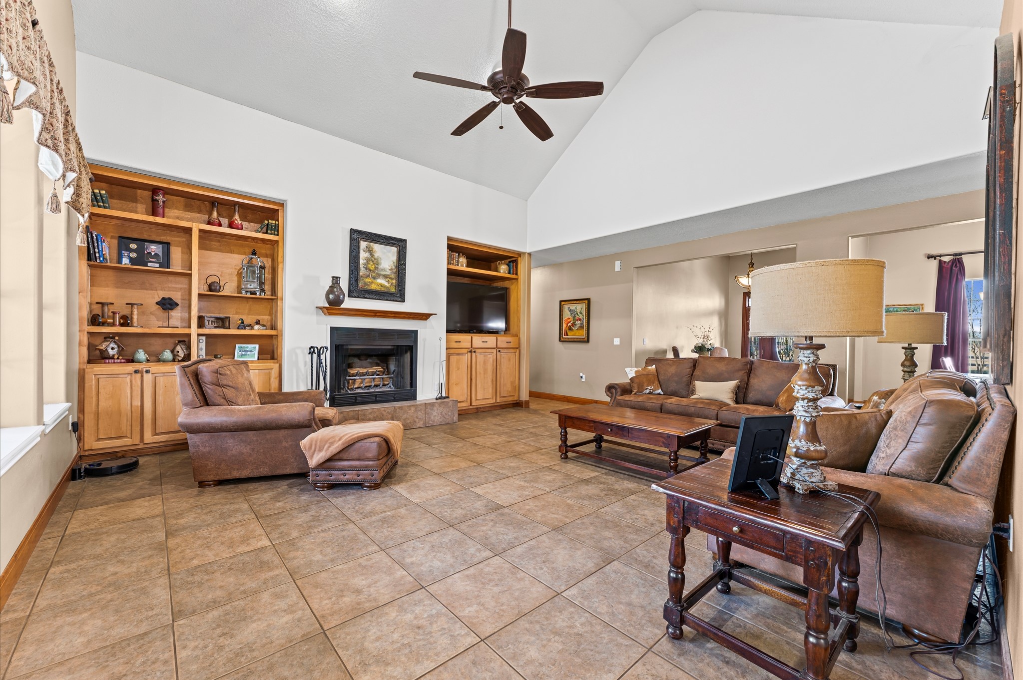 21550-21554 Mueschke Road Tomball, TX 77377 - Photo 6 of 42 a living room with furniture and a fireplace