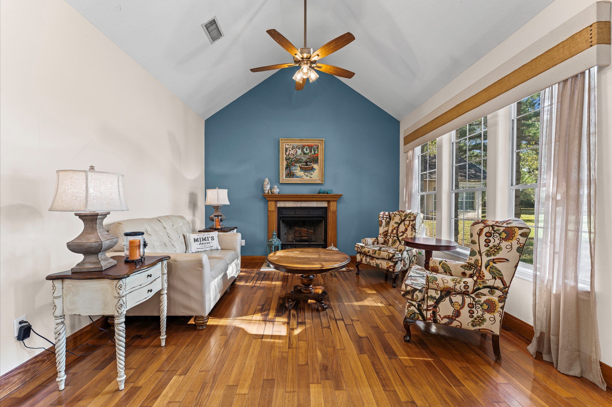 21550-21554 Mueschke Road Tomball, TX 77377 - Photo 10 of 42 a living room with furniture and a fireplace