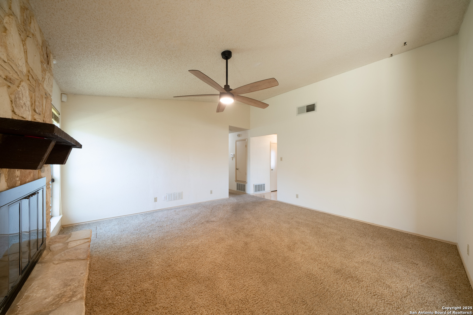 1514 Lochshire Street San Antonio, TX 78216 - Photo 14 of 30 an empty room with ceiling fan and window