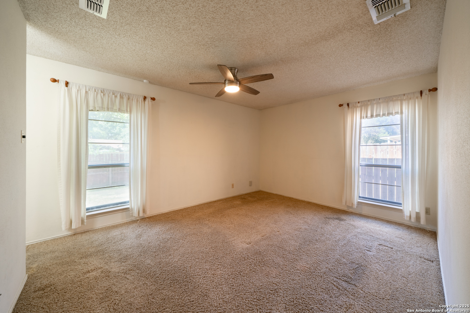 1514 Lochshire Street San Antonio, TX 78216 - Photo 18 of 30 an empty room with closet and windows