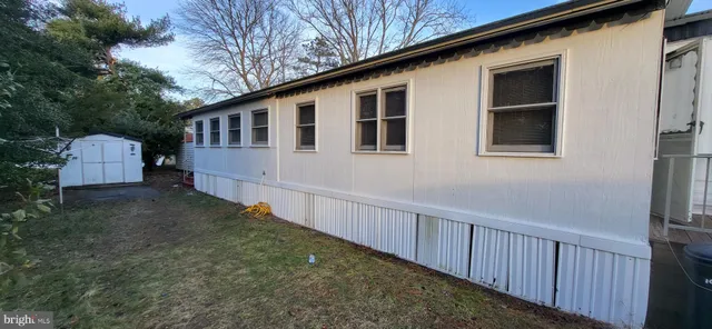 a house view with a backyard space