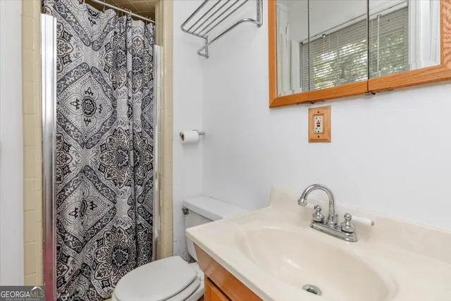 a view of a chair and tables