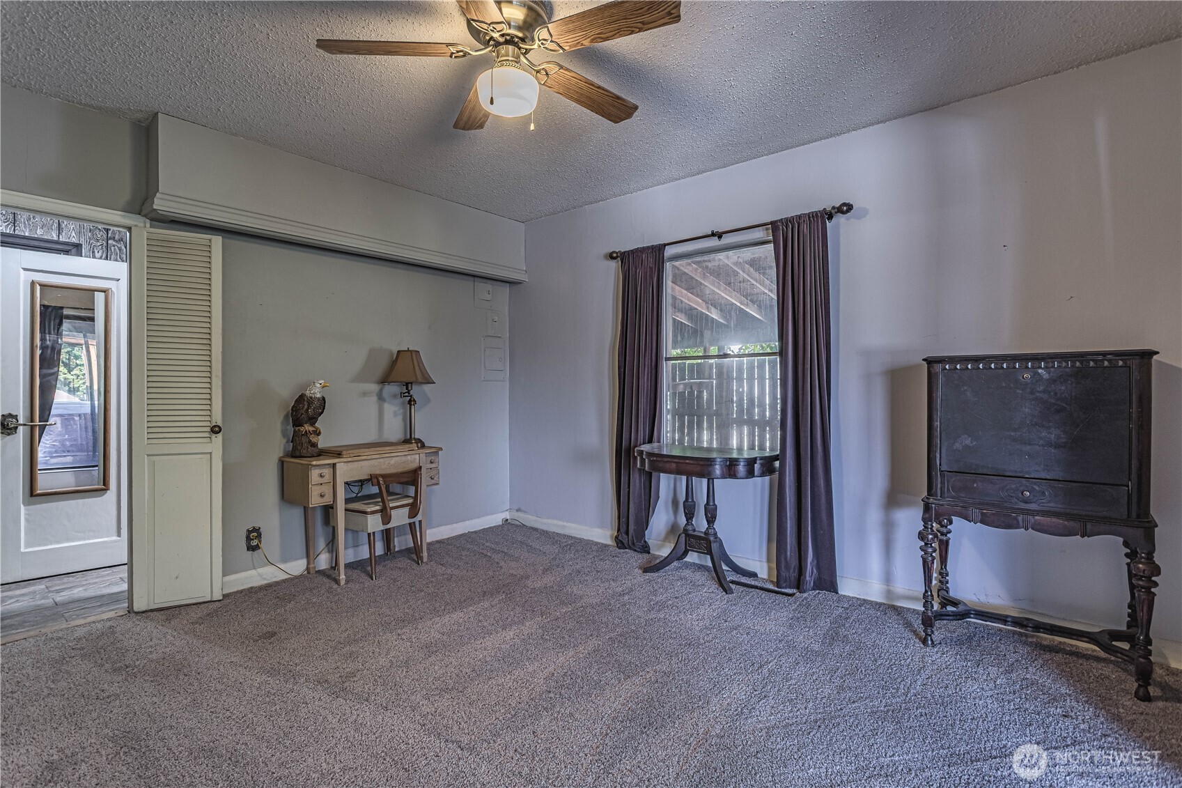 1314 Walnut Street Wenatchee, WA 98801 - Photo 12 of 40 a view of a livingroom with furniture and a ceiling fan