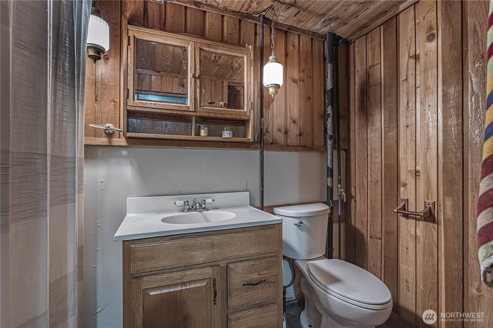 1314 Walnut Street Wenatchee, WA 98801 - Photo 20 of 40 a bathroom with a toilet a sink and shower