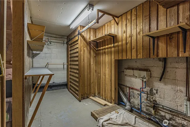 a view of an empty room and a window