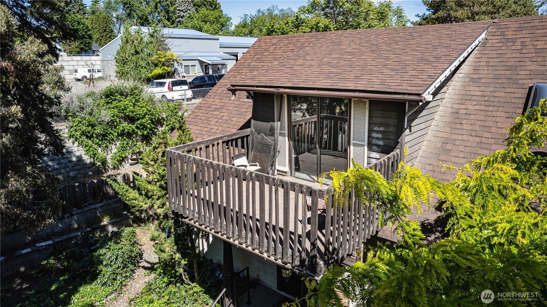 1314 Walnut Street Wenatchee, WA 98801 - Photo 30 of 40 a view of a house with a small yard and plants