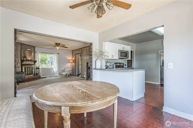 a kitchen with sink and center island