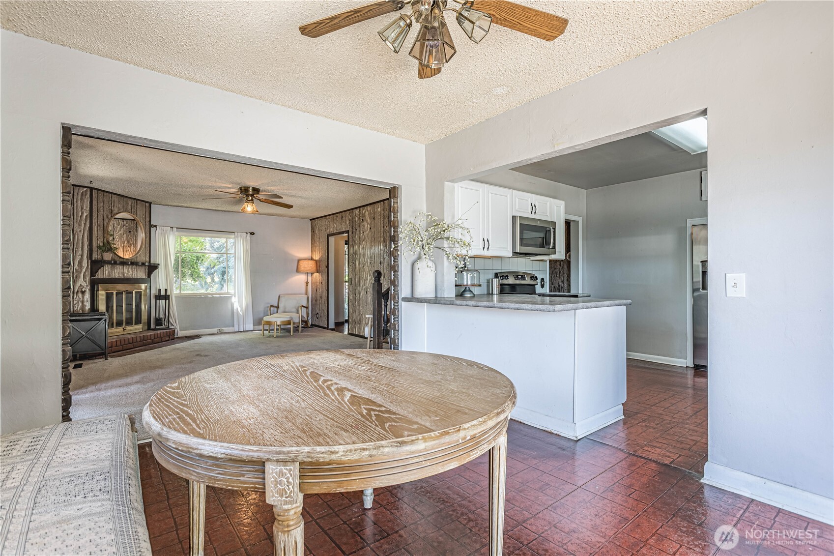 1314 Walnut Street Wenatchee, WA 98801 - Photo 8 of 40 a kitchen with sink and center island
