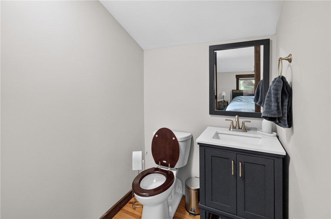130 Maggie Rufus Lane Westminster, SC 29693 - Photo 29 of 50 Functional full bathroom featuring rich wood flooring and a modern vanity.