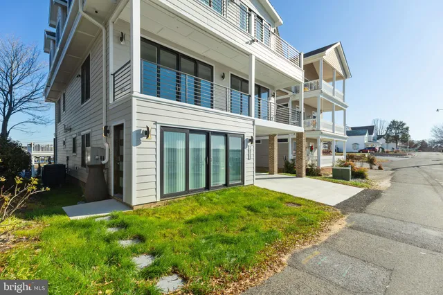 a view of a building with a yard