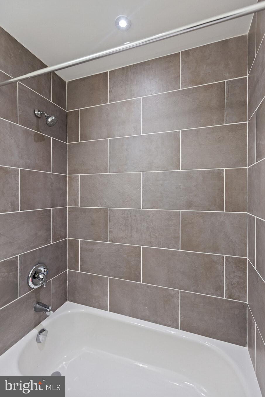 14732 Patuxent Avenue Solomons, MD 20688 - Photo 23 of 31 a view of a bathtub in a bathroom