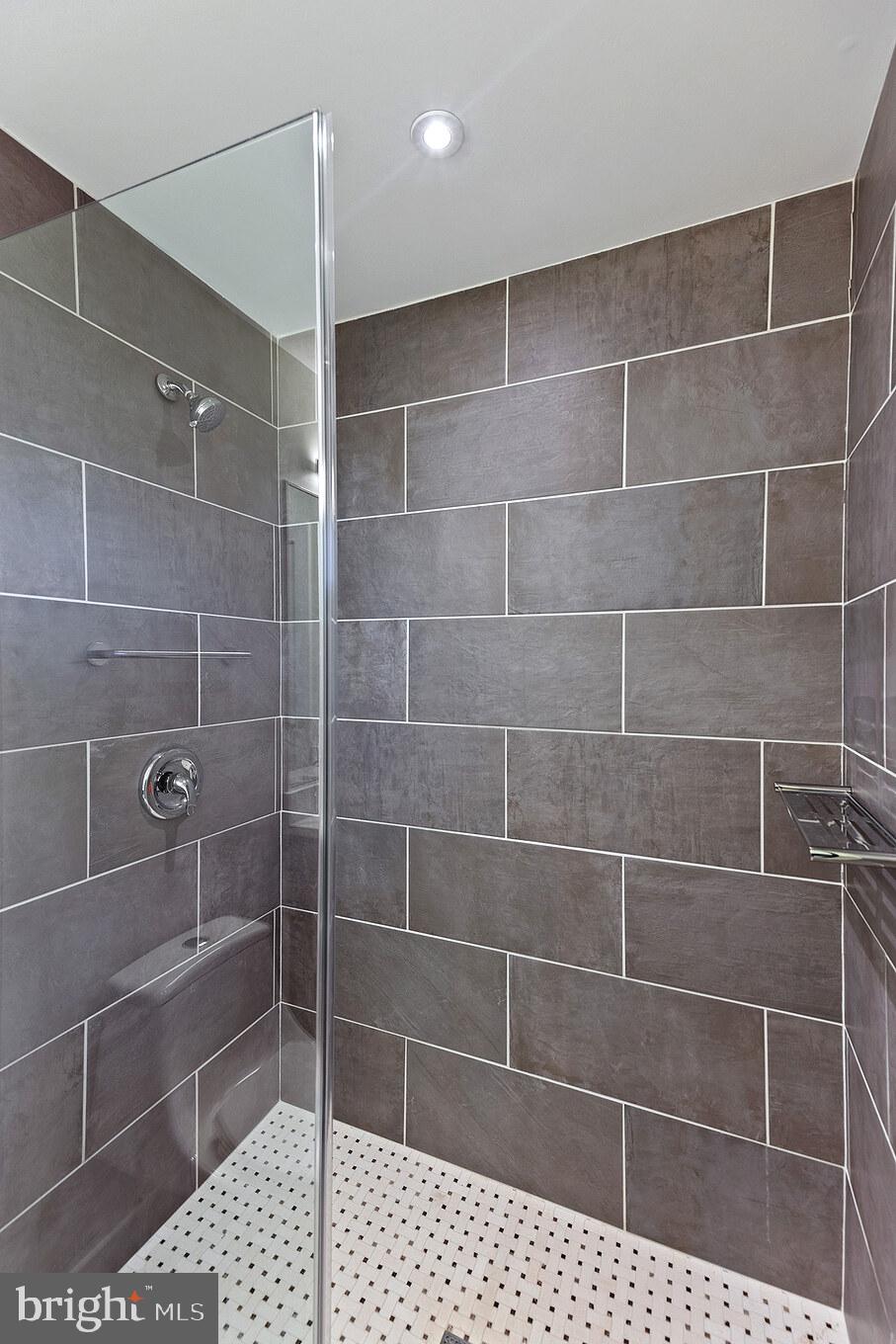 14732 Patuxent Avenue Solomons, MD 20688 - Photo 29 of 31 a bathroom with a shower