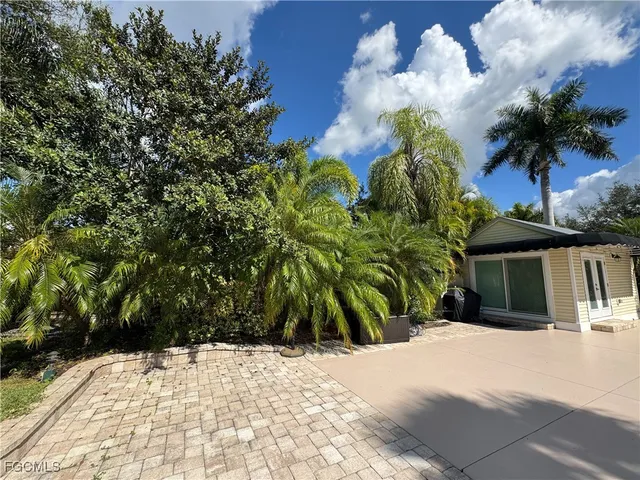 a house view with a garden space